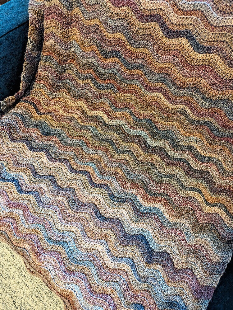 Painted Canyon Ripple Blanket on Couch