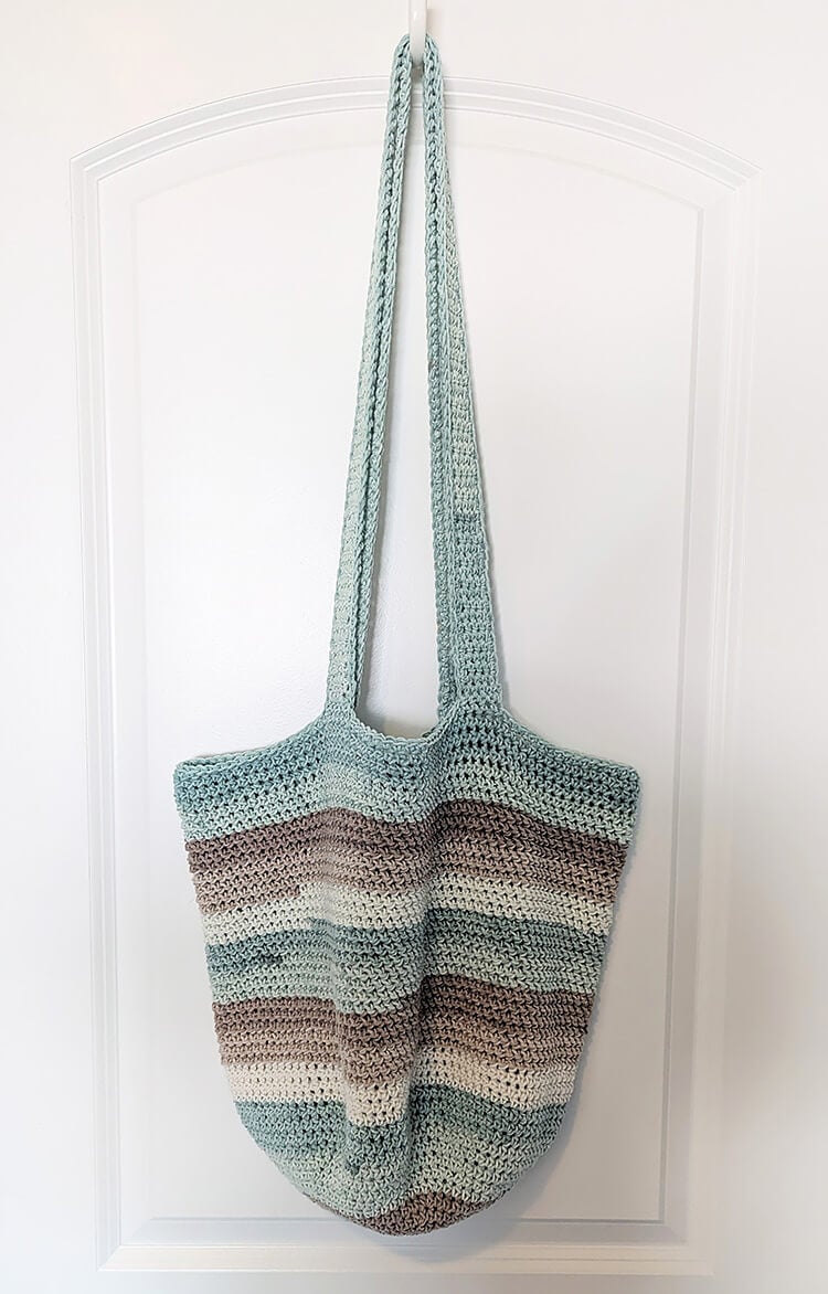 Seaside Bag Crochet Pattern Hanging on Door
